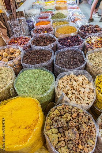 Middle East, Arabian Peninsula, Oman, Ad Dakhiliyah, Nizwa. Food and spices for sale in the souk in Nizwa, Oman.