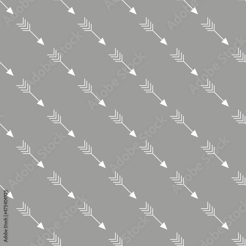 Geometric seamless pattern with repetitive crossed arrows on grey backdrop for Christmas theme designs.vector illustration 