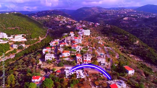Aerial village view in sunny weather. Signal blue lines. Futuristic technology