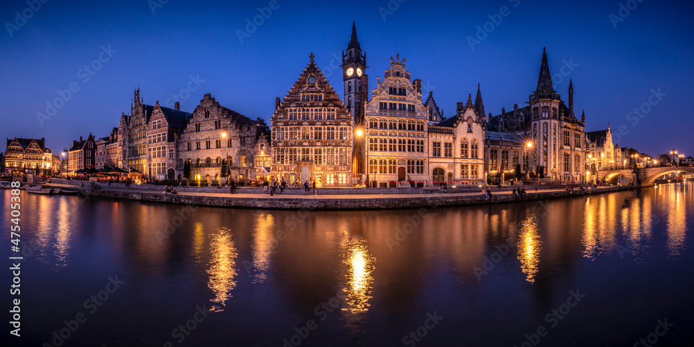 Europe, Belgium, Ghent. Panoramic of town and canal reflections at night.