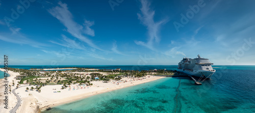 Panoramic Image of a Cruise Ship Docked at a Private Island in the Caribbean 