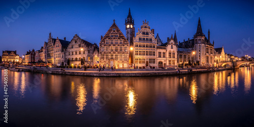 Europe, Belgium, Ghent. Panoramic of town and canal reflections at night.