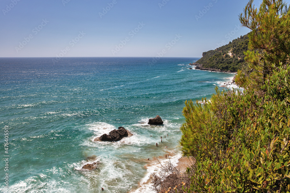 Sea waves crashing onto rocks with water splashes. Corfu island, Greece. Sea waves crashing onto rocks with water splashes. Corfu island, Greece.