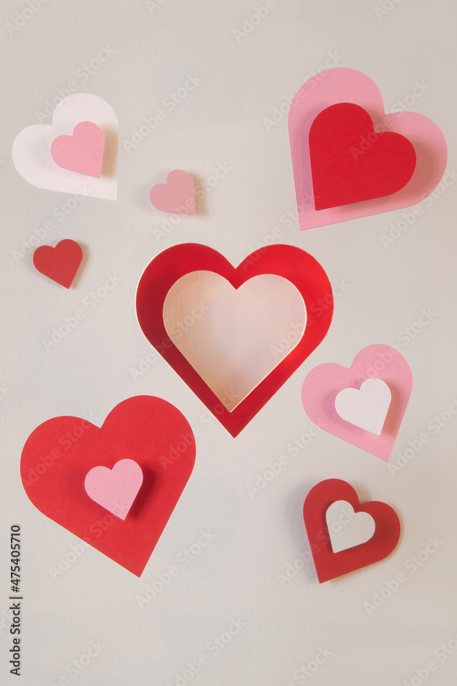 Multiple layers of heart shapes cut out of paper