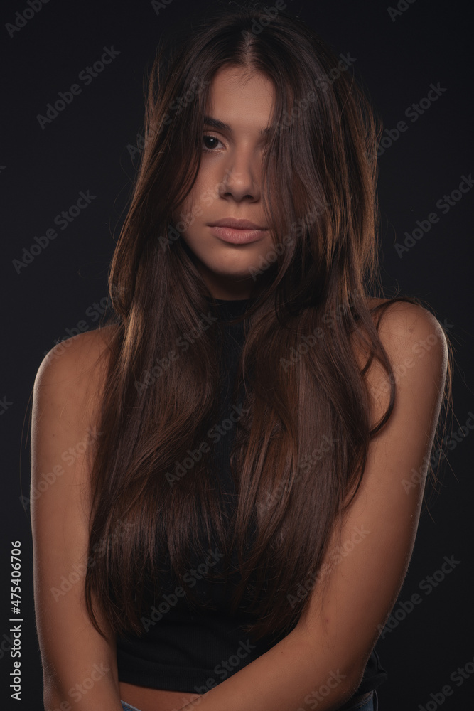 Portrait of girl making a serious face while posing Portrait of girl making a serious face while posing