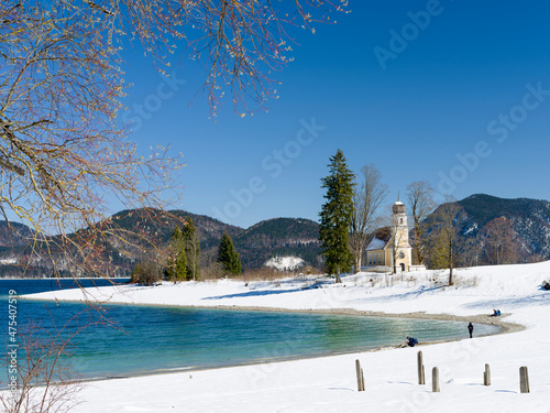 Church Sankt Margareth at Zwergern Spitz. Lake Walchensee near village Einsiedl in the snowy Bavarian Alps. Germany, Bavaria photo