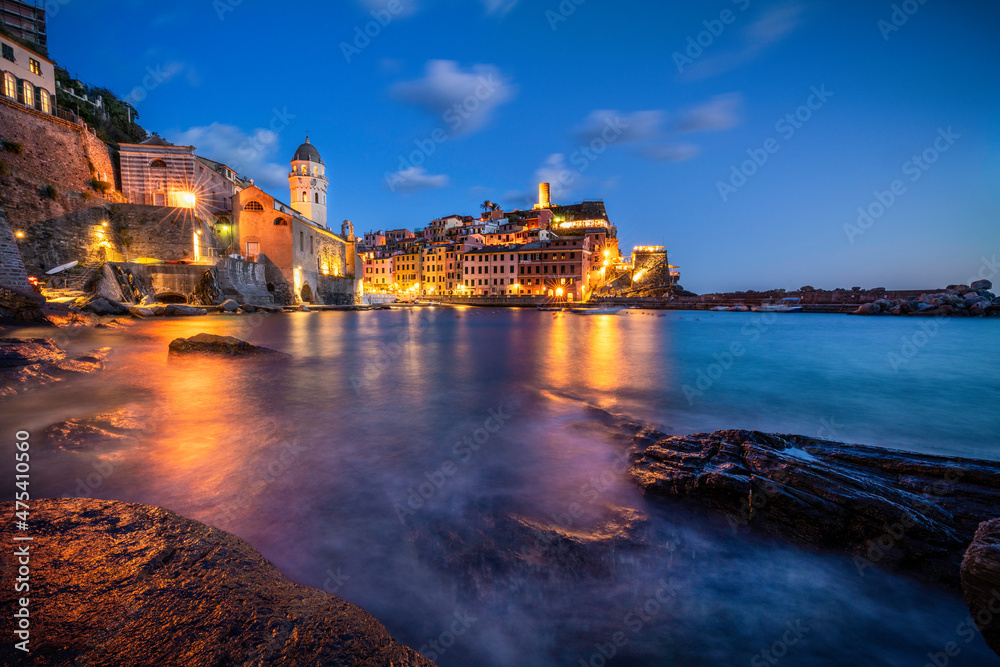 Europe, Italy, Vernazza. Landscape with village and ocean at sunset.