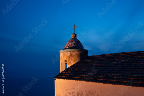 Europe, Italy, Furore. Church roof and steeple at sunset.