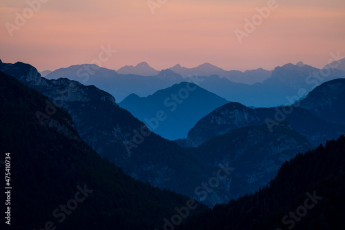 Europe, Italy, Friuli Venezia Giulia. Foggy Monte Lussari mountain at sunset.
