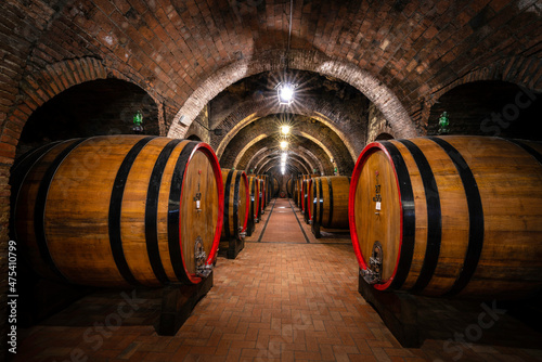 Фотография Europe, Italy, Montepulciano. Wine cellar in town.