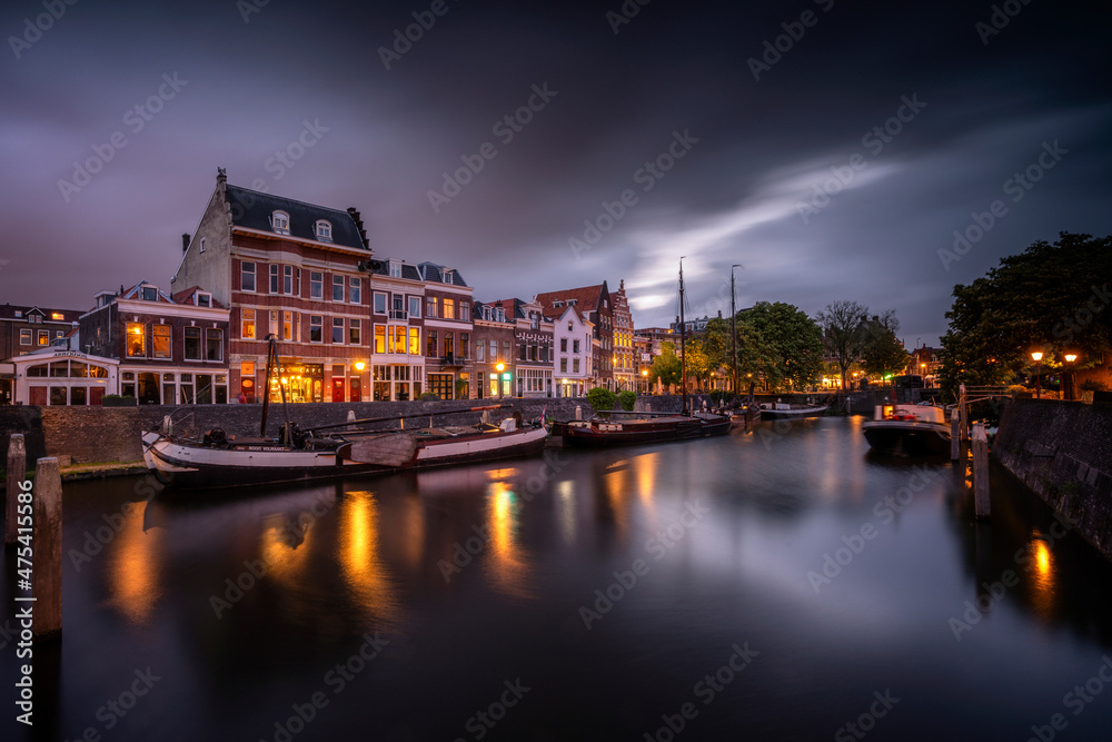 Europe, The Netherlands, Delfshaven. Sunset scene along canal.
