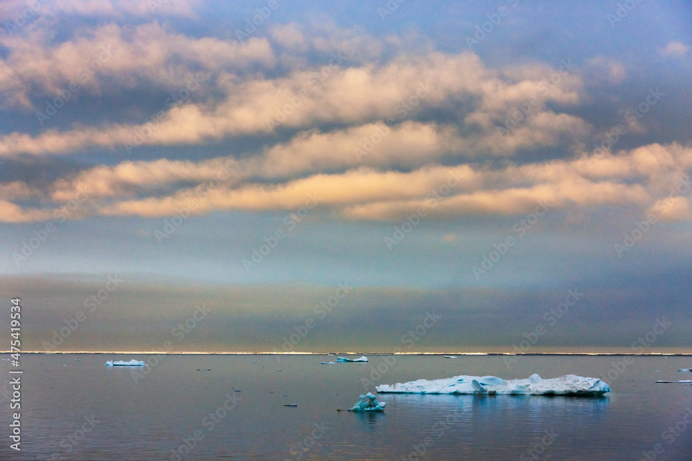 Sunset view of floating ice on Bering Sea, Russia Far East