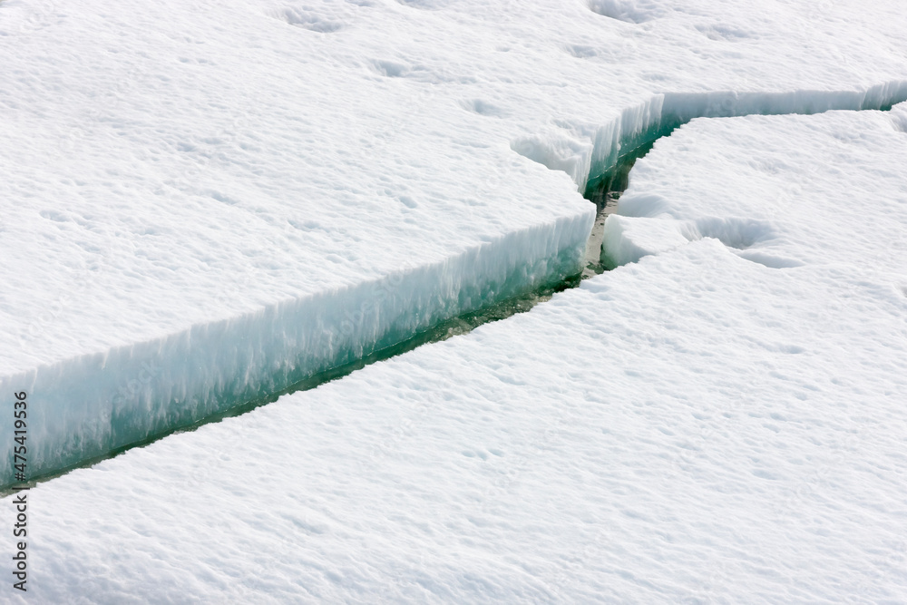 Crack on ice, Bering Sea, Russia Far East Crack on ice, Bering Sea, Russia Far East