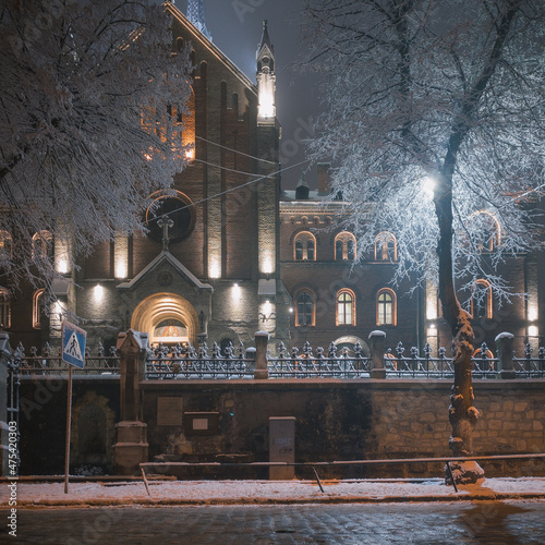 Lviv, Ukraine - december 2021: ST. IOANN ZOLOTOUSTYI CHURCH (FORMER FRANCISCAN ORDER CHURCH). Winter night time.