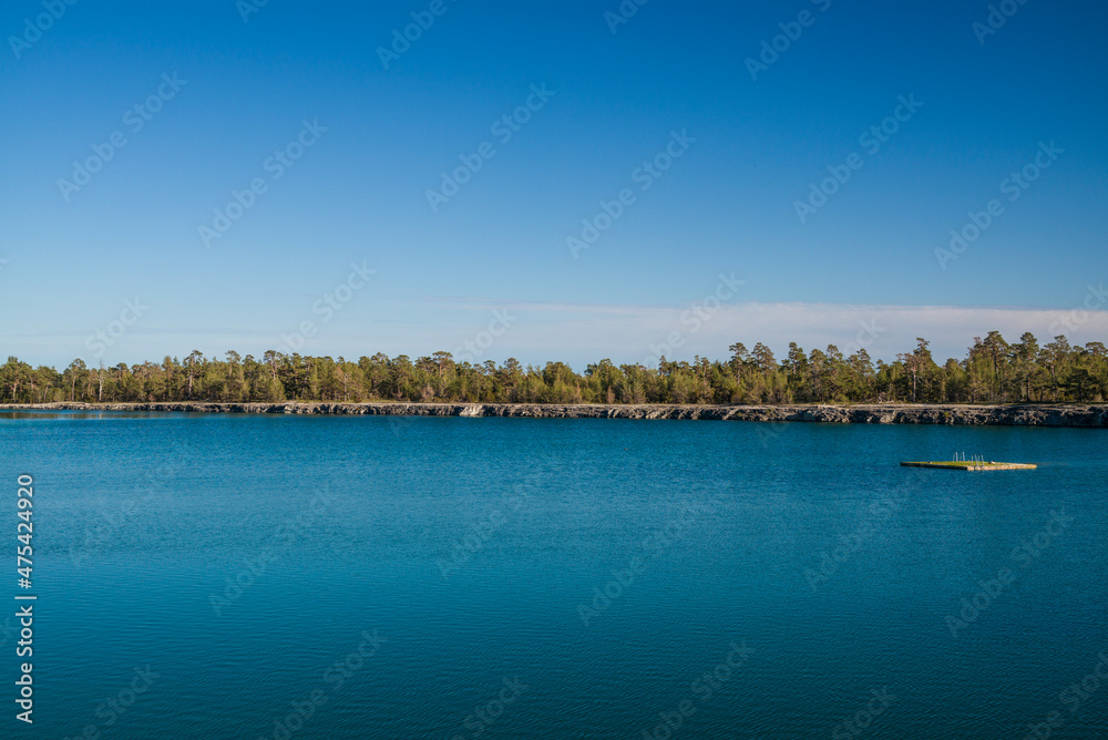 Sweden, Gotland Island, Labro, Bla Lagunen, Blue Lagoon, natural swimming area in former chalk quarry with blue green water Sweden, Gotland Island, Labro, Bla Lagunen, Blue Lagoon, natural swimming area in former chalk quarry with blue green water