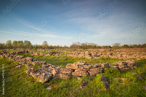 Sweden, Oland Island, Ismantorp, ruins of Ismantorp fortress, Bronze Age fortified town, sunset