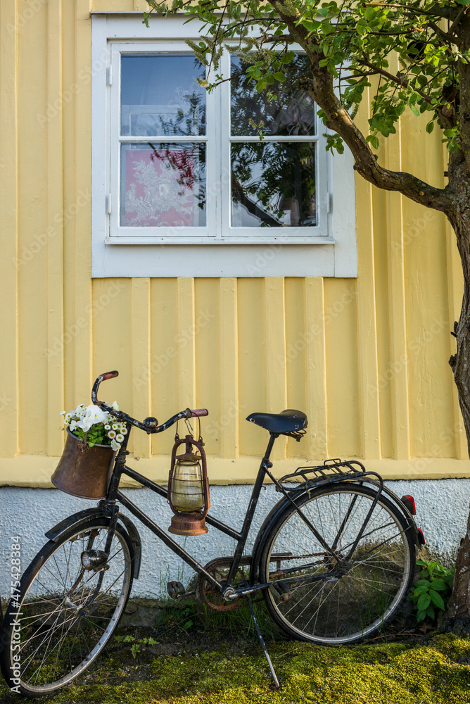 Southern Sweden, Karlskrona, Bjorkholmen area, the neighborhood of naval craftsmen, bicycle