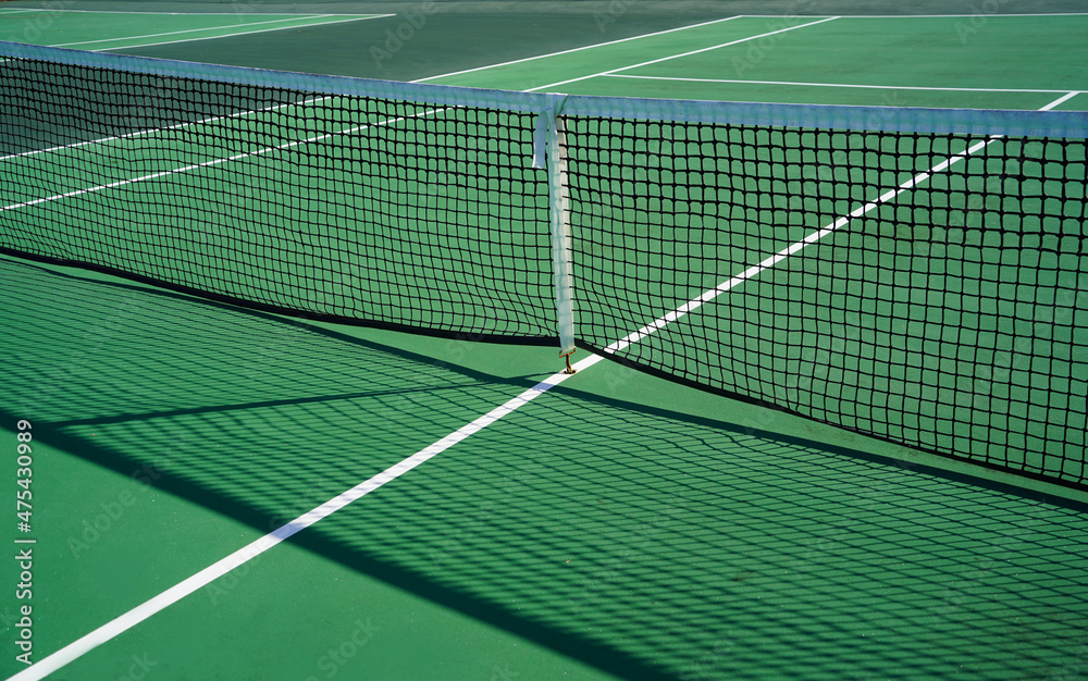 Close up of tennis court and net.
