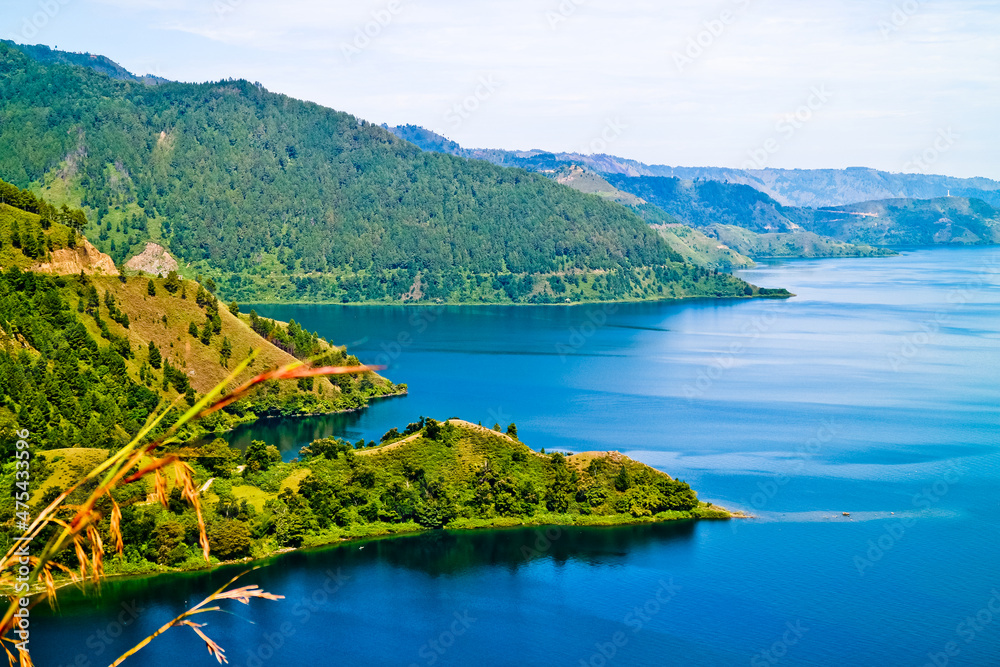 The beauty of Lake Toba which is a caldera lake comes from an ancient volcanic eruption and is the largest volcanic lake in the world. North Sumatra, Indonesia