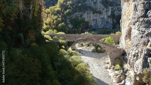 The beautiful old stone bridge known as Kokkoris or Noutsios bridge, near Ioannina town, Epirus Greece. photo