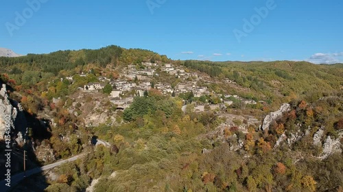 Aerial panoramic view of the picturesque village Kipi Located near Dilofo village in Epirus, Greece. Scenic aerial view of traditional Greek villages in Autumn. Epirus, Greece, Europe. photo