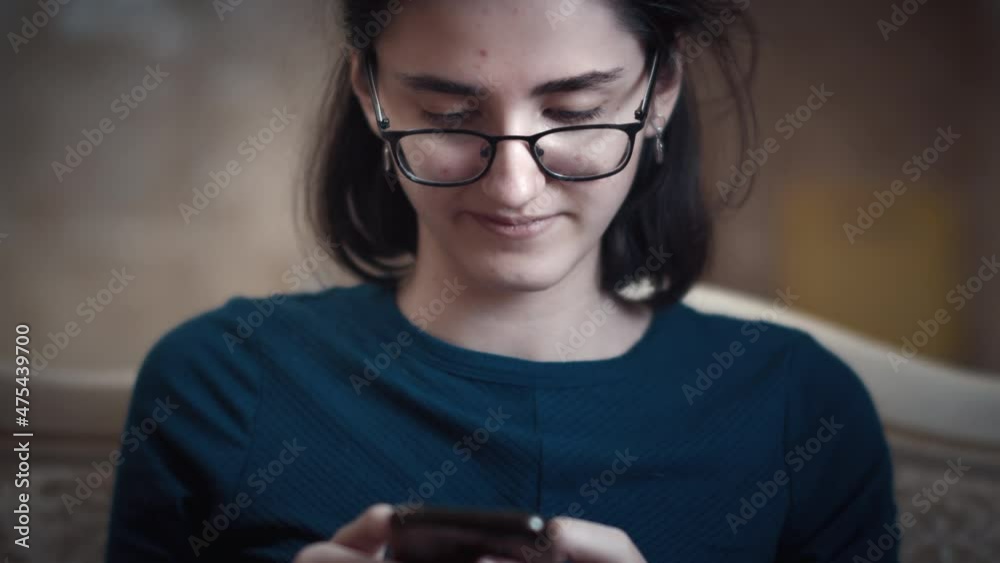 positive girl uses the phone, chatting with friends, good news, correspondence with a loved one positive girl uses the phone, chatting with friends, good news, correspondence with a loved one