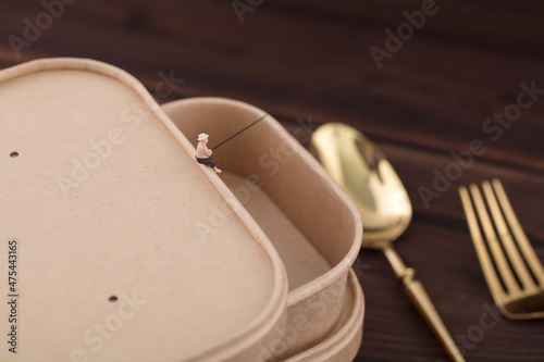 A fisherman on a miniature world lunch box