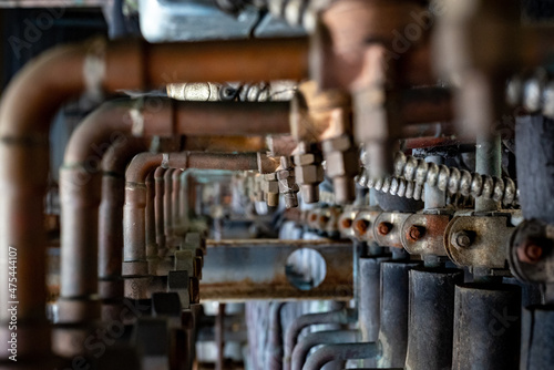 Photography Weathered rusty refrigeration rack in a factory