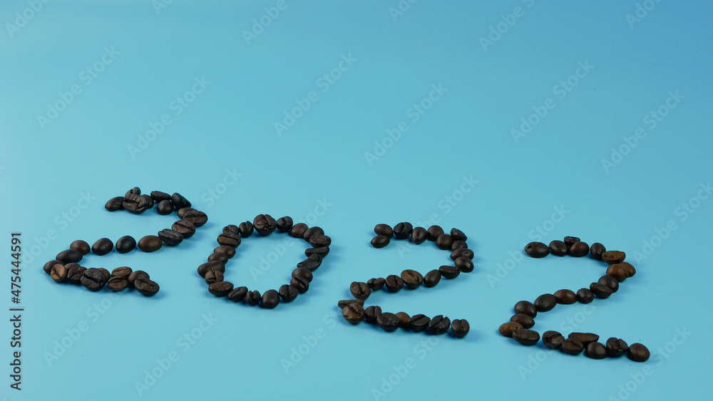 idea and creative number 2022, coffee beans on a blue background
