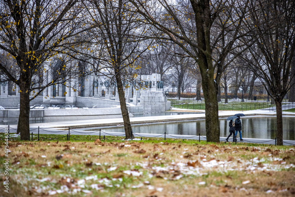 USA, District of Columbia. A snowy afternoon at the World War II Memorial