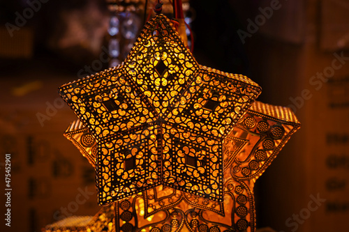 Photography Ornamental lights Christmas light lightning lantern star hanging Christmas market Kerala India lots of bright colorful stars night photo