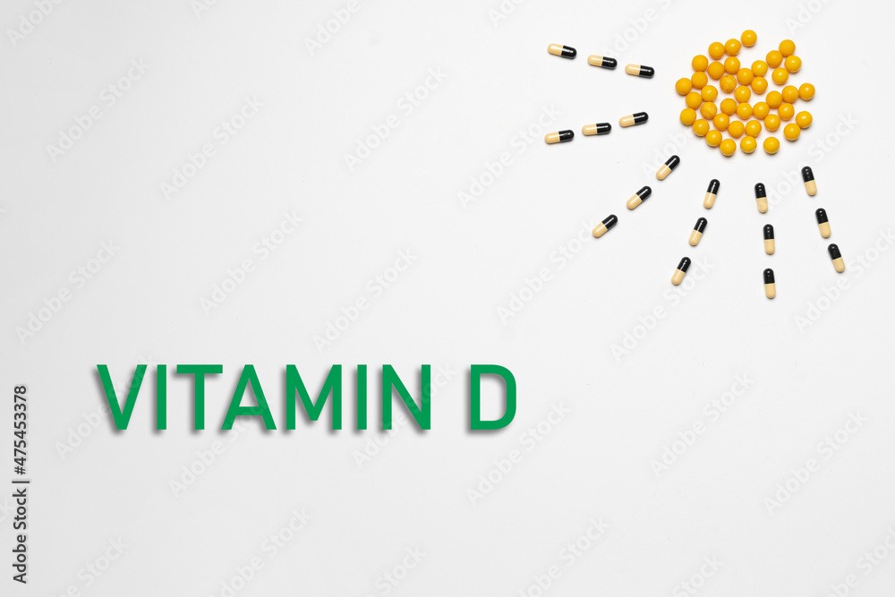 the sun with rays made of medicine pills as the symbol of vitamin D Stock Photo Adobe Stock