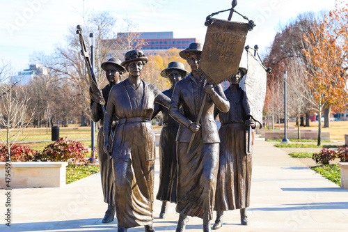 a shot of the copper statues at the Tennessee Woman's Suffrage Monument at Centennial Park in Nashville Tennessee USA photo