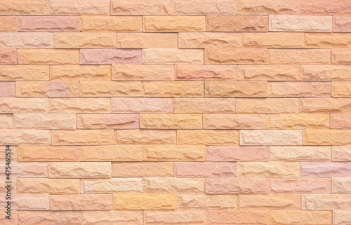 Orange and white brick wall texture background. Brickwork and stonework flooring interior rock old pattern design.