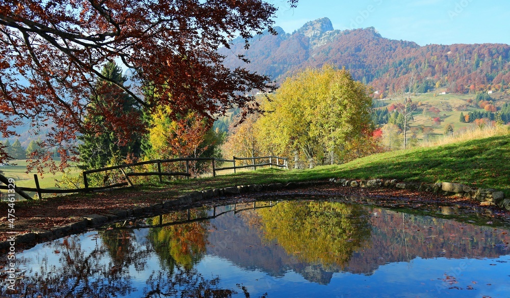 natural environment with the little alpine lake and the reflection of the mountain natural environment with the little alpine lake and the reflection of the mountain