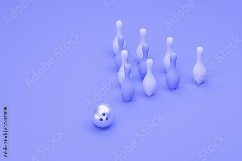 Fototapeta Bowling ball and scattered purple skittles isolated on yellow background