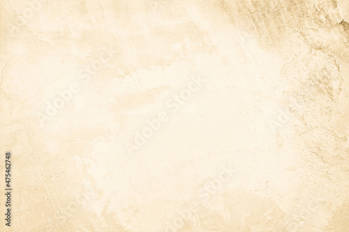 Cream concrete wall for interiors or outdoor exposed surface polished concrete. Cement have sand and stone of tone vintage, natural patterns old texture background. © siripak