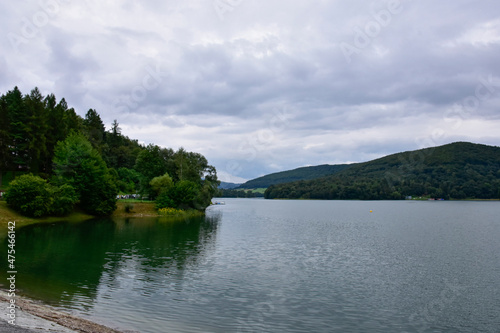 Bieszczady Mountains  view of the artificial lake Solina  a Polish tourist attraction on a cloudy day during the holidays. 