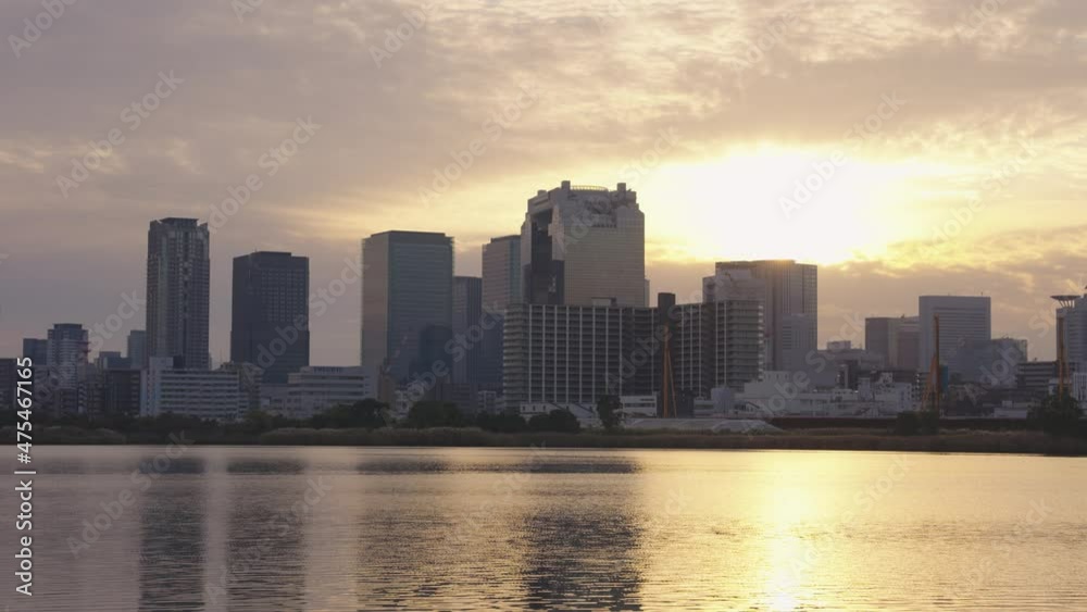 Umeda District, Osaka City Skyline at Sunrise on Peaceful Day Japan Umeda District, Osaka City Skyline at Sunrise on Peaceful Day Japan