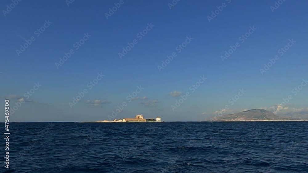 Approaching Islet of Formica in Sicily with navigating boat, Italy. Slow motion Approaching Islet of Formica in Sicily with navigating boat, Italy. Slow motion
