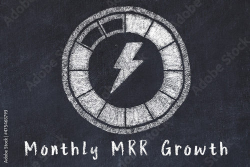 Chalk drawing of low energy indicatior. KPI concept, high Monthly MRR Growth photo