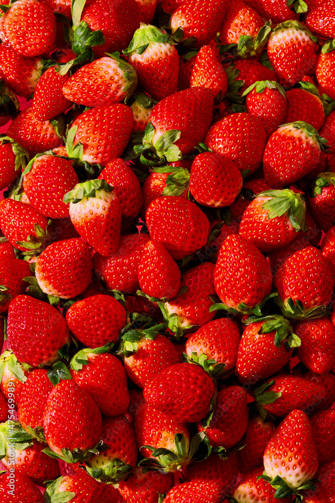 Background full with beautiful strawberry fruit , front view and blank space for product advertising Background full with beautiful strawberry fruit , front view and blank space for product advertising