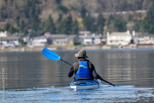 Issaquah, Washington State, USA. African-American kayaker paddling in Lake Sammamish State Park. (Editorial Use Only) photo