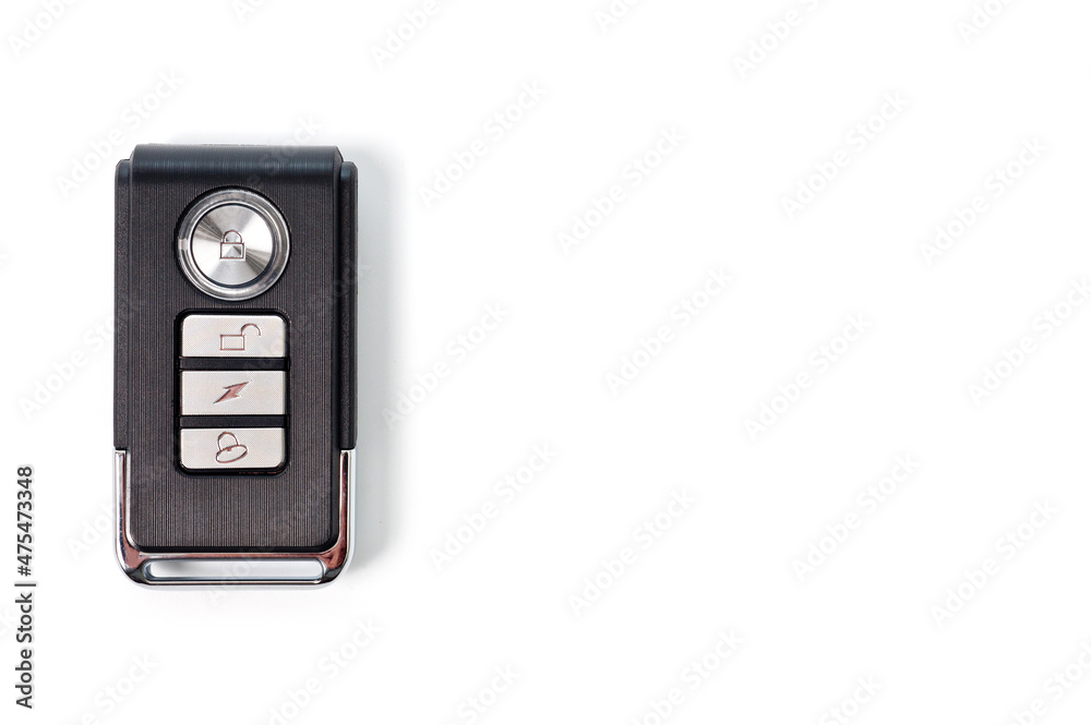 Fototapeta premium Compact remote control and anti-theft alarm for motorcycle or bicycle.