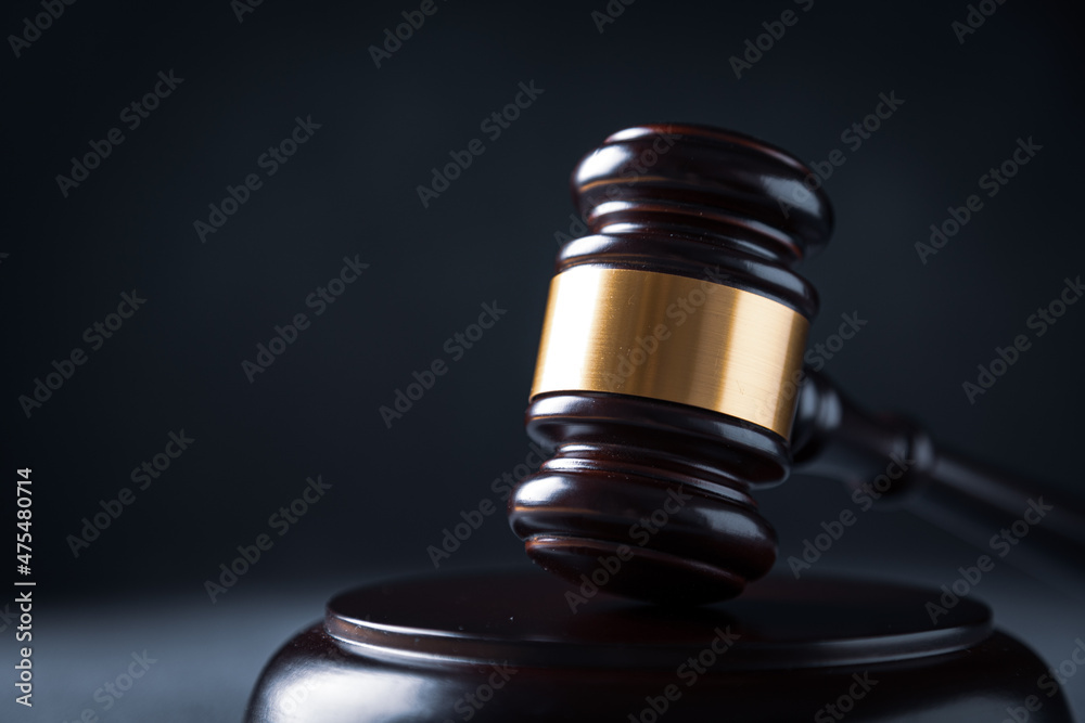 Law and justice. Wooden judge gavel, close-up view. Law and justice. Wooden judge gavel, close-up view.