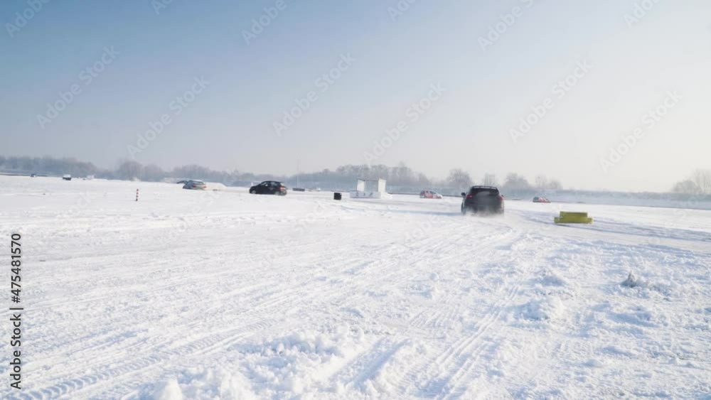 Sport car 4wd hatchback hot hatch starts on the snow aggresively Sport car 4wd hatchback hot hatch starts on the snow aggresively