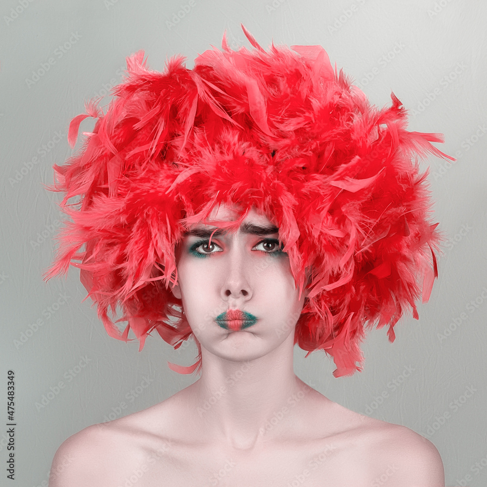Fototapeta premium clown girl with feathers on her head