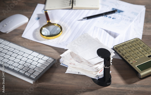 Stack of unpaid financial bills on the desk. Business. Finance
