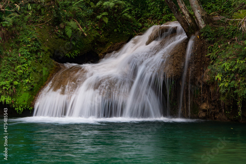 Beautiful view of a waterfall in Topes de Collantes, Cuba photo