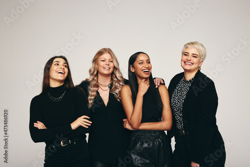Fotografiet Strong group of women standing in a studio